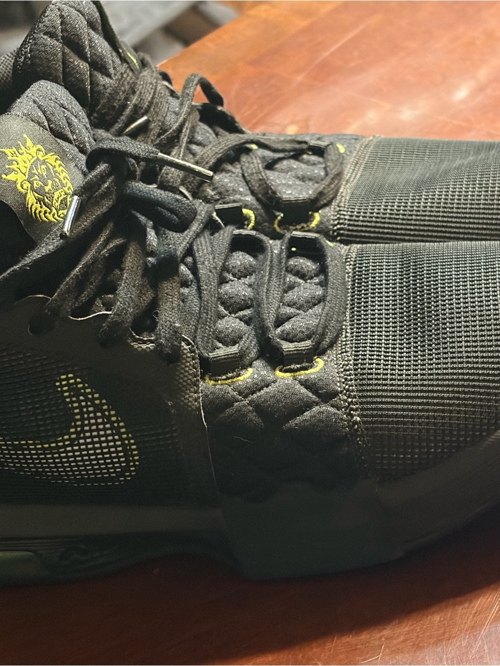 Nike Men’s Black Athletic Shoes with Yellow Highlights